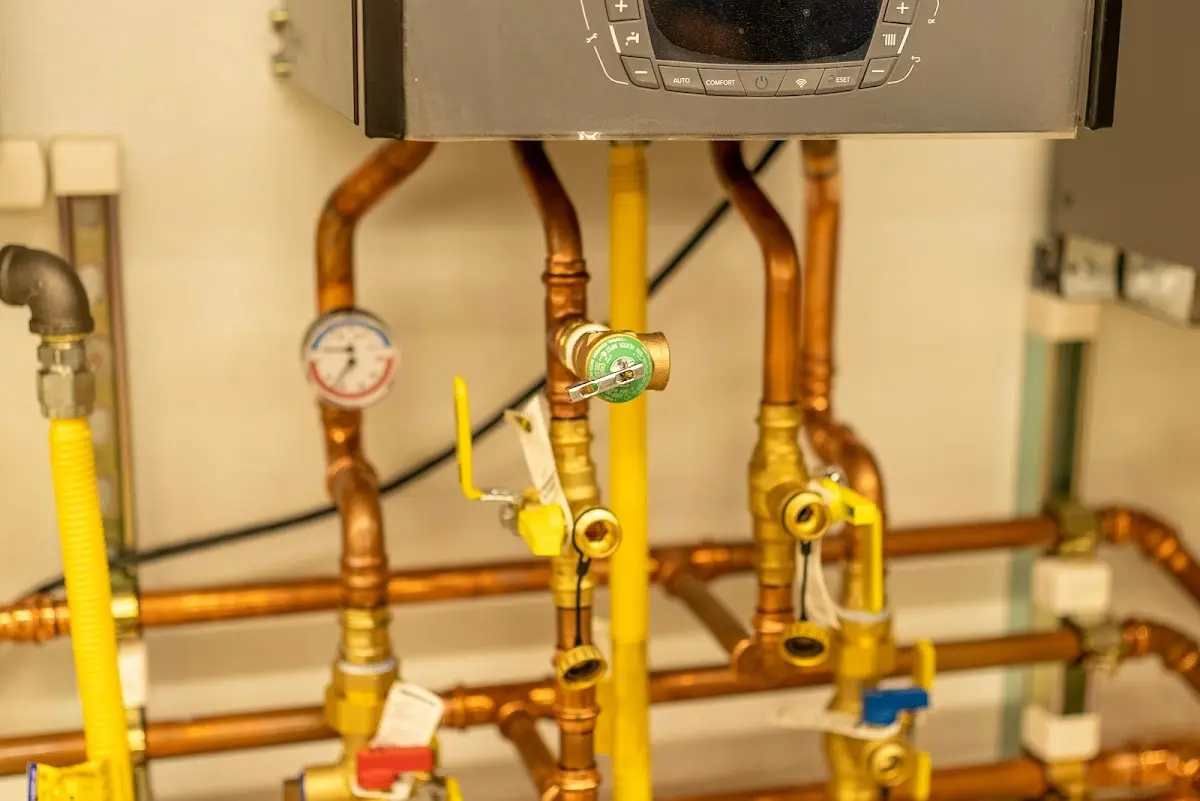 Licensed technician providing Water Heater Installation for a homeowner in Proctor